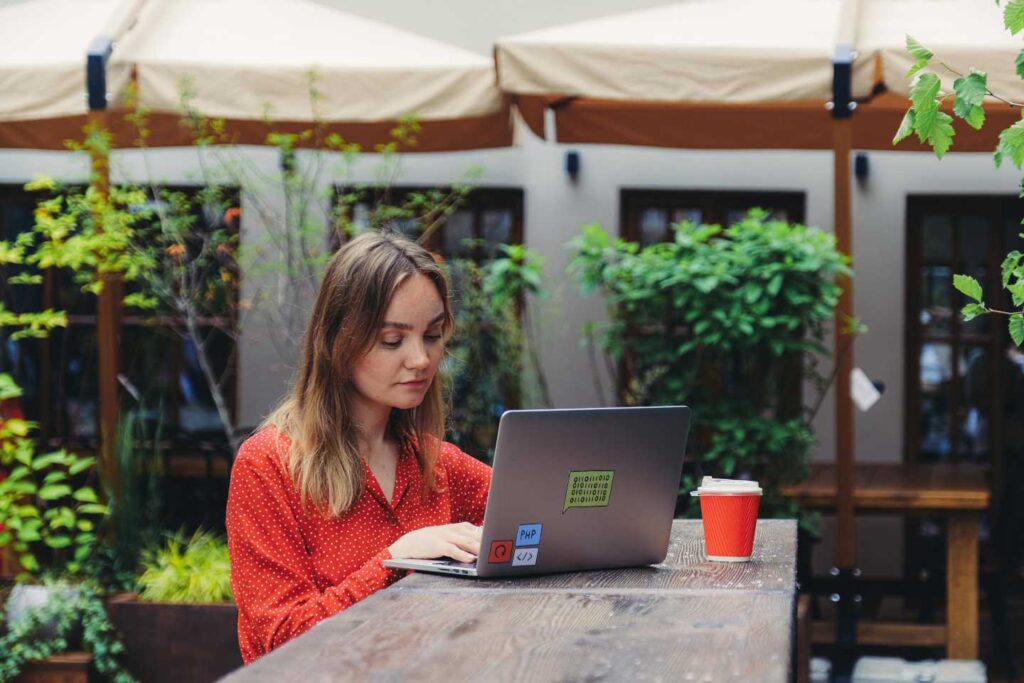 Woman Working Remotely on Laptop
